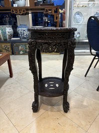 Two finely carved Chinese marble-topped hongmu stands, 19th C.