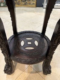 Two finely carved Chinese marble-topped hongmu stands, 19th C.