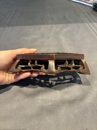 A collection of 38 Chinese wooden stands and a box, 19/20th C.