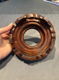 A collection of 38 Chinese wooden stands and a box, 19/20th C.