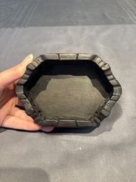 A collection of 38 Chinese wooden stands and a box, 19/20th C.