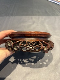 A collection of 38 Chinese wooden stands and a box, 19/20th C.