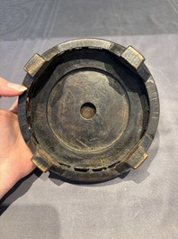 A collection of 38 Chinese wooden stands and a box, 19/20th C.