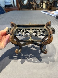 A collection of 38 Chinese wooden stands and a box, 19/20th C.