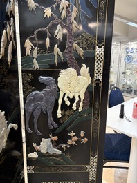 A Chinese precious-stone-inset gilt-lacquered four-panel 'Ba Jun Tu 八骏图' folding screen, 20th C.