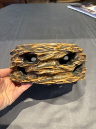 A collection of 38 Chinese wooden stands and a box, 19/20th C.