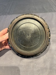 A collection of 38 Chinese wooden stands and a box, 19/20th C.