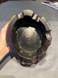 A collection of 38 Chinese wooden stands and a box, 19/20th C.