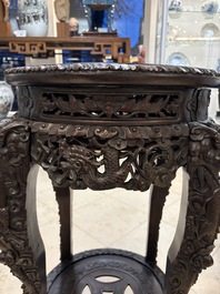 Two finely carved Chinese marble-topped hongmu stands, 19th C.