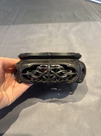 A collection of 38 Chinese wooden stands and a box, 19/20th C.