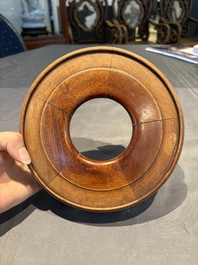 A collection of 38 Chinese wooden stands and a box, 19/20th C.