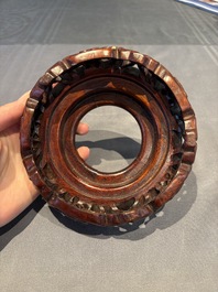 A collection of 38 Chinese wooden stands and a box, 19/20th C.