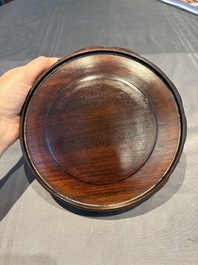 A collection of 38 Chinese wooden stands and a box, 19/20th C.