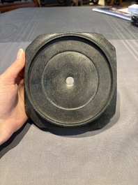 A collection of 38 Chinese wooden stands and a box, 19/20th C.