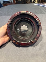 A collection of 38 Chinese wooden stands and a box, 19/20th C.