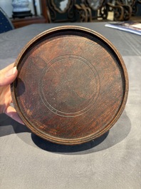 A collection of 38 Chinese wooden stands and a box, 19/20th C.