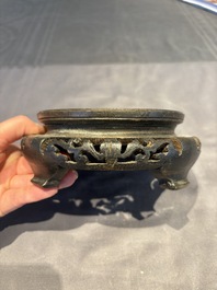 A collection of 38 Chinese wooden stands and a box, 19/20th C.