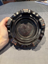 A collection of 38 Chinese wooden stands and a box, 19/20th C.