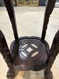 Two finely carved Chinese marble-topped hongmu stands, 19th C.