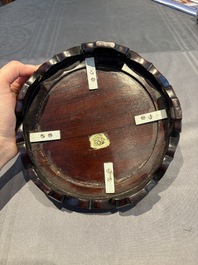 A collection of 38 Chinese wooden stands and a box, 19/20th C.