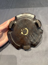 A collection of 38 Chinese wooden stands and a box, 19/20th C.