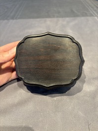 A collection of 38 Chinese wooden stands and a box, 19/20th C.