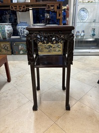 Two Chinese marble-topped hongmu two-tier square stands, 19/20th C.