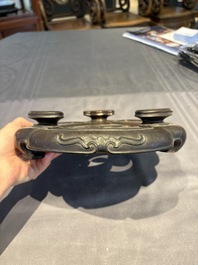 A collection of 38 Chinese wooden stands and a box, 19/20th C.