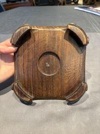 A collection of 38 Chinese wooden stands and a box, 19/20th C.