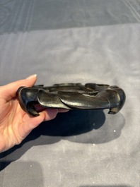 A collection of 38 Chinese wooden stands and a box, 19/20th C.