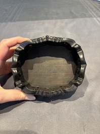 A collection of 38 Chinese wooden stands and a box, 19/20th C.