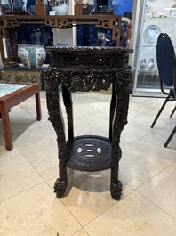 Two finely carved Chinese marble-topped hongmu stands, 19th C.