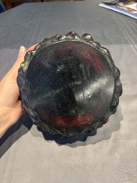 A collection of 38 Chinese wooden stands and a box, 19/20th C.