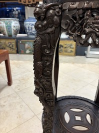 Two finely carved Chinese marble-topped hongmu stands, 19th C.