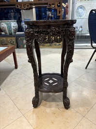 Two finely carved Chinese marble-topped hongmu stands, 19th C.