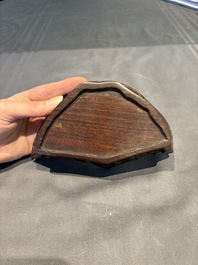 A collection of 38 Chinese wooden stands and a box, 19/20th C.