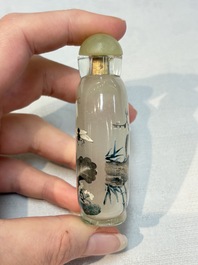 A Chinese rock crystal and two glass inside painted snuff bottles, 19/20th C., with a signed copy of 'Chinese Inside Painting of the Modern Age', 2005