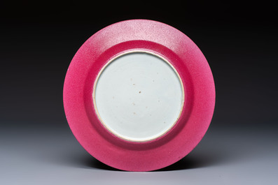 A Chinese famille rose ruby-back plate with a bird on a blossoming branch, Yongzheng