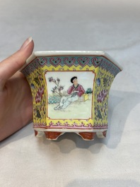 Seven Chinese famille rose vases, a scroll jar and a jardini&egrave;re on a stand, Qianlong marks, 20th C.