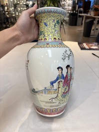 Seven Chinese famille rose vases, a scroll jar and a jardini&egrave;re on a stand, Qianlong marks, 20th C.