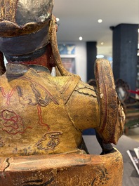 A large Chinese gilt-lacquered and polychrome wooden figure of Guandi, 19th C.