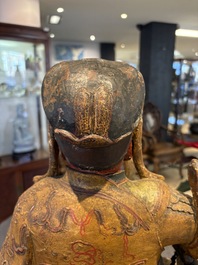 A large Chinese gilt-lacquered and polychrome wooden figure of Guandi, 19th C.