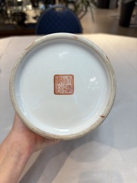 Seven Chinese famille rose vases, a scroll jar and a jardini&egrave;re on a stand, Qianlong marks, 20th C.