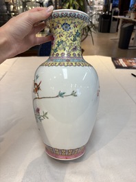 Seven Chinese famille rose vases, a scroll jar and a jardini&egrave;re on a stand, Qianlong marks, 20th C.