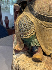 A large Chinese gilt-lacquered and polychrome wooden figure of Guandi, 19th C.