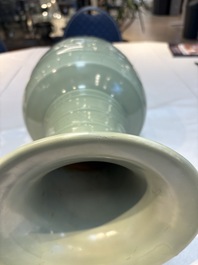 A Chinese celadon-glazed vase with relief lotus scroll design, 18th C.