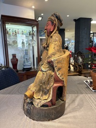 A large Chinese gilt-lacquered and polychrome wooden figure of Guandi, 19th C.