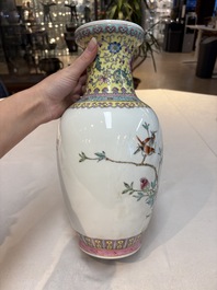 Seven Chinese famille rose vases, a scroll jar and a jardini&egrave;re on a stand, Qianlong marks, 20th C.
