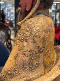 A large Chinese gilt-lacquered and polychrome wooden figure of Guandi, 19th C.