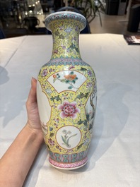 Seven Chinese famille rose vases, a scroll jar and a jardini&egrave;re on a stand, Qianlong marks, 20th C.